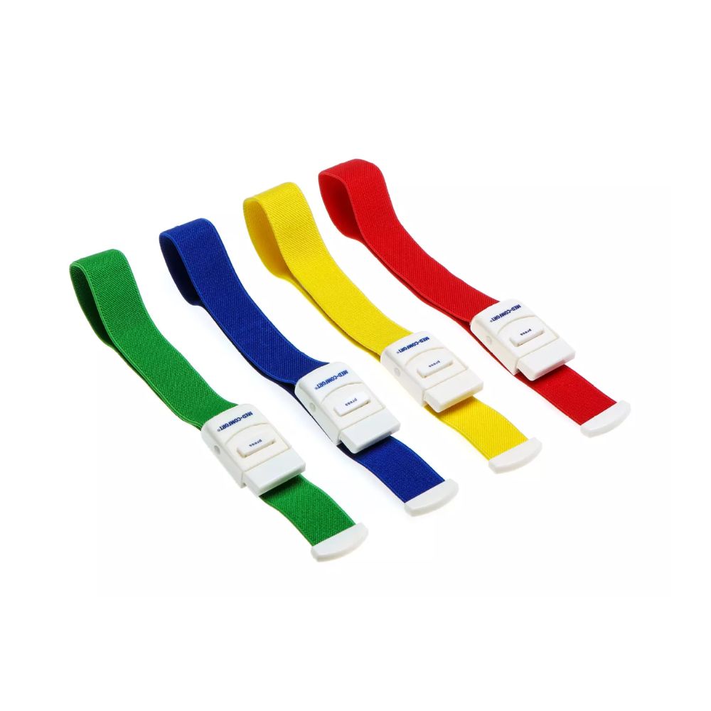 Four AMPri MED-COMFORT tourniquets are lined up: green, blue, yellow, and red straps with white buckles and release buttons. They are identical except for the color and are ideal for use in hospitals.
