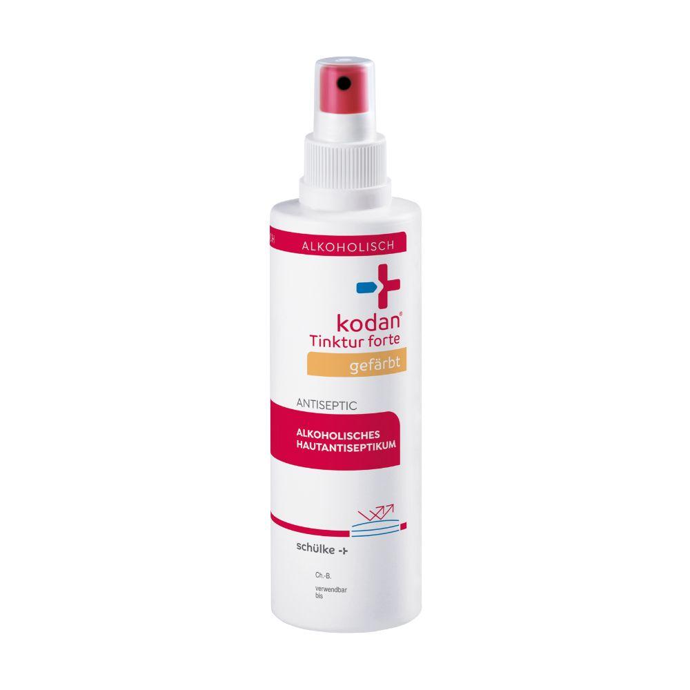 A white-pink spray bottle Schülke kodan® Tincture forte skin antiseptic colored by Schülke & Mayr GmbH with German text and white cap.