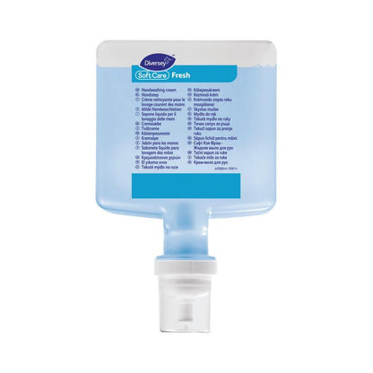 A rectangular, transparent soap dispenser made of plastic with a white pump at the bottom contains the blue Soft Care Fresh Mild Handwash Lotion from Diversey Deutschland GmbH & Co. OHG. The label shows "gentle cleaning" and multilingual instructions for use.