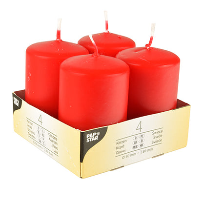 Starpak 4 pillar candles Ø 50 mm · 80 mm "Ivory" with a flat top are arranged in a lightweight cardboard tray, with product information on the side in multiple languages, each candle features a white wick.