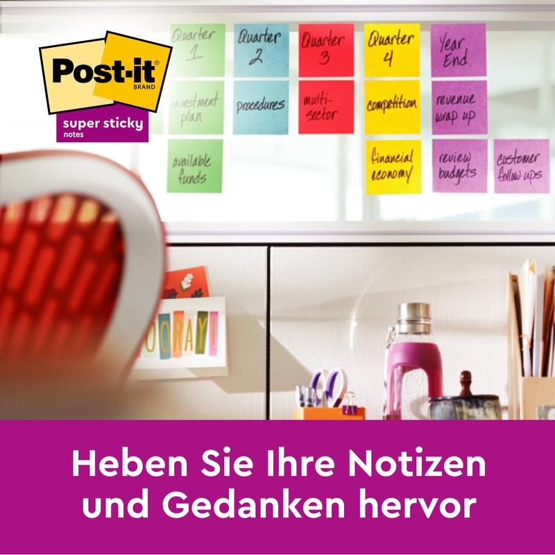 A workspace with 3M Post-it® Super Sticky Notes in large format (101 x 101 mm, lined, 45 sheets/block, 100% PEFC) from 3M Deutschland GmbH on a glass wall, with organized office supplies. Highlight your notes and ideas.