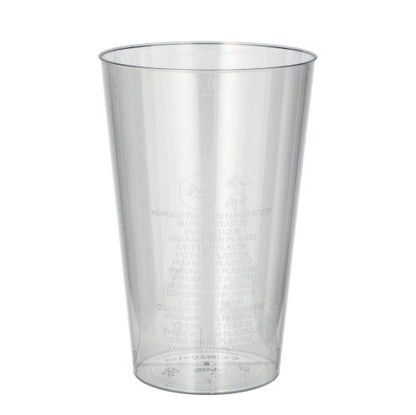 A Starpak 50 drinking cup made of crystal-clear polystyrene stands upright on a white background; measurement scales and recycling symbols are clearly visible on the side.