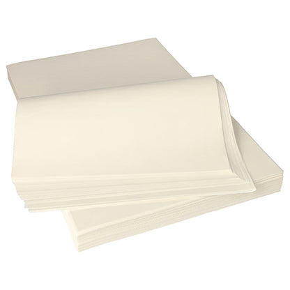 A stack of smooth, unlined PAPSTAR parchment substitute "pure" white sheets (12.5 kg, greaseproof) from PAPSTAR GmbH is partially overlapping. These eco-friendly, cream-colored sheets are biodegradable and ideal for sustainable use.