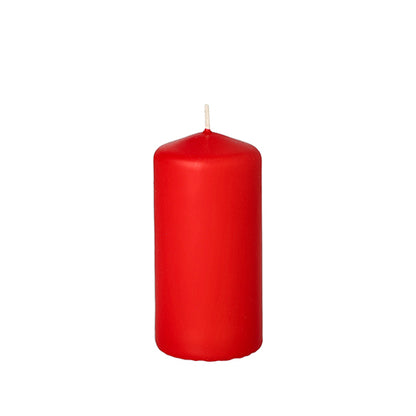 A single, unlit Starpak pillar candle with extra long burning time (Ø 50 mm, height 100 mm) and visible wick stands upright against a white background.