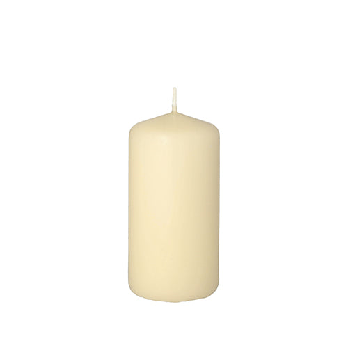 The Starpak pillar candle with extra long burning time, Ø 50 mm, 100 mm, is an unlit ivory-colored pillar candle with a smooth cylindrical shape and visible wick, depicted against a simple white background – ideal for long-lasting ambiance.