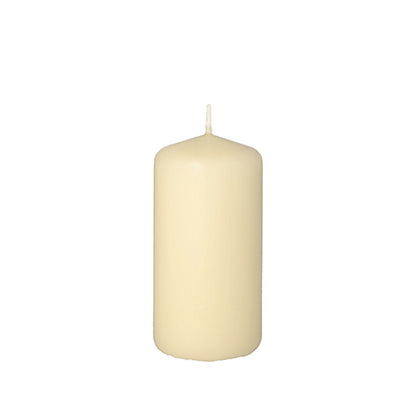 The Starpak pillar candle with extra long burning time, Ø 50 mm, 100 mm, is an unlit ivory-colored pillar candle with a smooth cylindrical shape and visible wick, depicted against a simple white background – ideal for long-lasting ambiance.