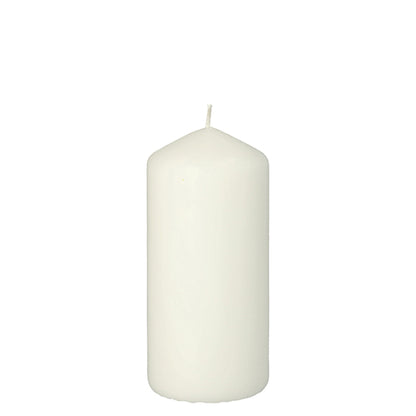 The Starpak pillar candle with extra long burning time (Ø 60 mm, 130 mm) in plain white stands unlit and with a wick against a white background – perfect for stylish accents and lasting light.