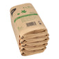 A stack of PAPSTAR waste bags kraft paper 10 l, 35x21x15 cm, brown (50 pieces) from PAPSTAR GmbH, folded and bundled for environmentally friendly disposal - compostable and made from recycled materials.