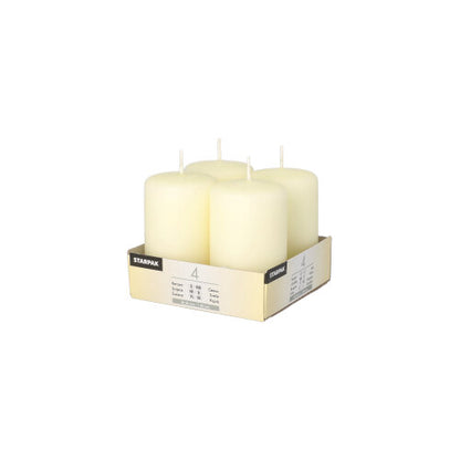 Four unused Starpak 4 pillar candles Ø 50 mm · 80 mm "Ivory" with a flat top stand upright in a labeled cardboard tray, wicks unburnt, on a plain white background.