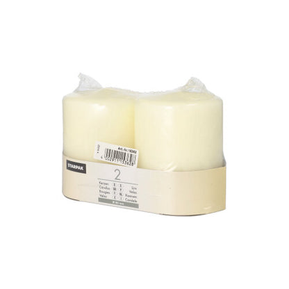 Two white Starpak 2 pillar candles Ø 80 mm with flat top are packaged together in transparent plastic and feature a beige label with product information and barcode on a plain white background.