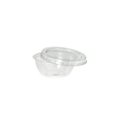 A clear, round Starpak 100 lid (PS, Ø 6.7 cm, 1 cm high), perfect for food packaging, is presented against a plain white background.