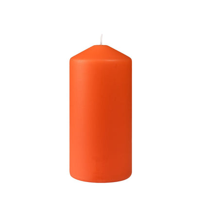 The Duni GmbH pillar candle, approx. 50h (150 x 70 mm), is a simple orange cylindrical candle with a flat bottom and a white wick, standing upright against a white background. It offers an impressive burn time of approximately 50 hours.