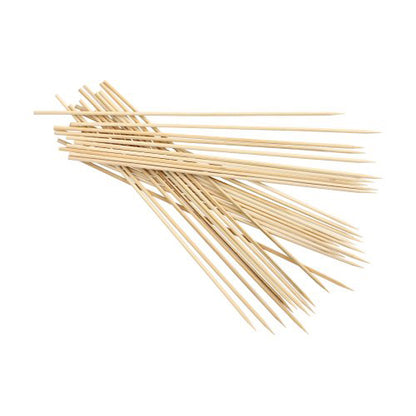 A scattered pile of PAPSTAR 250 bamboo skewers, "pure" from PAPSTAR GmbH, each eco-friendly and biodegradable skewer with a sharp, pointed end.