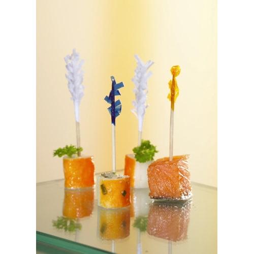 Four bite-sized snacks, each skewered with a PAPSTAR 1000 decoration pick 6.8 cm "Frills" from PAPSTAR GmbH, consist of fish and vegetable cubes garnished with parsley, elegantly arranged as a stylish table decoration.