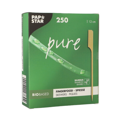 A green box labeled "PAPSTAR 250 Fingerfood - Skewers 'pure'" from PAPSTAR GmbH contains 250 bamboo skewers, each 12 cm long, perfect for party buffets. The package features a skewer, a green plant, and the inscriptions "Biobased" and "Bamboo".