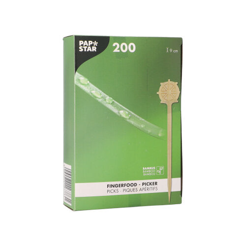 A green box of the PAPSTAR GmbH finger food picks "Steering Wheel" 9 cm (200 pieces) on a cardboard tray is depicted with a pick and product details on the packaging - perfect for parties.