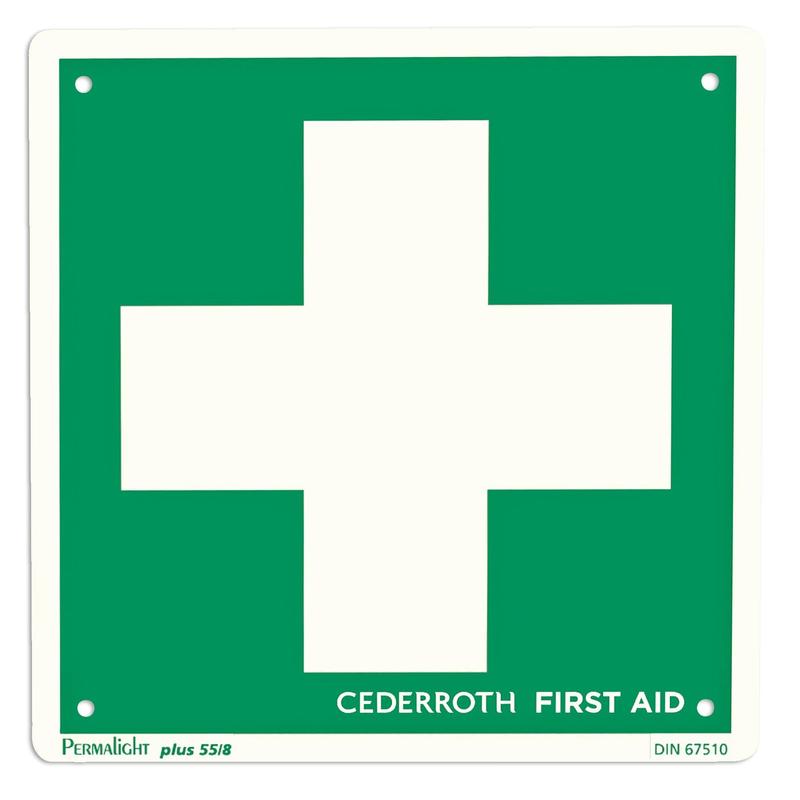 A green rescue sign - Cross by Orkla Wound Care AB with a large white cross in the center; the product details are at the bottom left and "CEDERROTH FIRST AID" is shown at the bottom right. The package contains 1 piece.