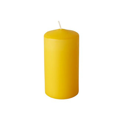 A single, unlit pillar candle from Starpak (6 pillar candles Ø 60 mm · 115 mm) with a white wick made from high-quality wax stands upright against a simple white background.
