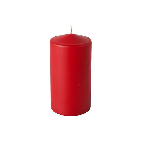 A single Starpak pillar candle (Ø 60 mm, 115 mm) in red with a flat top and an unlit wick made from high-quality wax for long burning time stands upright against a simple white background. Part of the Starpak 6 pillar candles set.
