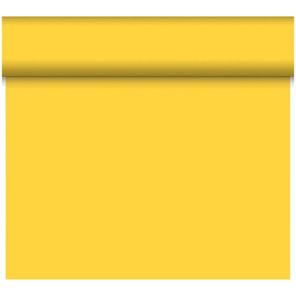 A partially unrolled Dunicel table runner Tête-à-Tête 24 m x 0.4 m (20 sections) by Duni GmbH casts a soft shadow on its smooth, evenly colored surface - perfect for stylish table decoration at your next tête-à-tête.