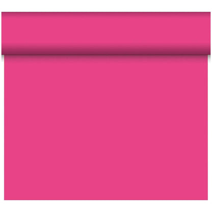 A partially unrolled Dunicel table runner Tête-à-Tête (24 m x 0.4 m, 20 sections) by Duni GmbH in vibrant pink casts a shadow along the top edge; its smooth surface is perfect for elegant table decoration.