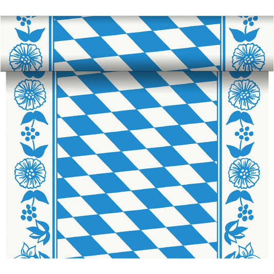 Der Dunicel-Tischläufer Tête-à-Tête (24 m x 0,4 m, 20 Abschnitte) der Duni GmbH zeigt ein blau-weißes Rautenmuster mit floralen Bordüren und einem Rollrand für eine elegante Tischdekoration.