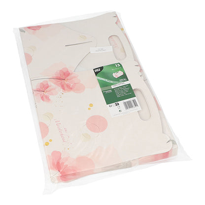 The PAPSTAR 15 pastry boxes, rectangular pink cardboard with a carrying handle from PAPSTAR GmbH are in a transparent plastic packaging with a floral pink-white design, ideal for transporting baked goods, and feature a green-white label with information and barcode.
