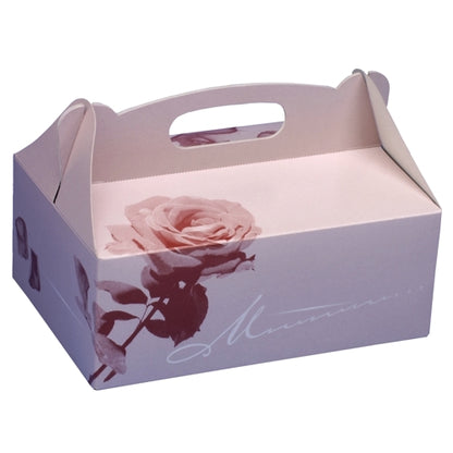 The PAPSTAR 15 pastry boxes from PAPSTAR GmbH are rectangular, light pink boxes with a carrying handle, matte rose design, large rose motif, and elegant script on the front and sides. The boxes are empty.