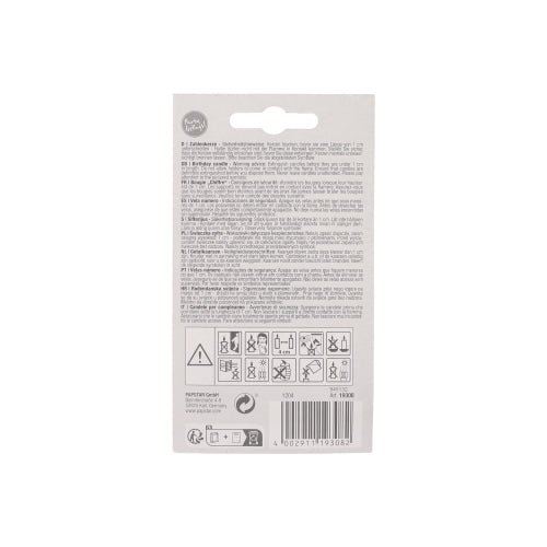 The image shows the back of a PAPSTAR number candle 7.3 cm white with red border packaging from PAPSTAR GmbH, with multilingual instructions, warning symbols, barcode, and recycling symbols - perfect for anniversaries and birthdays.