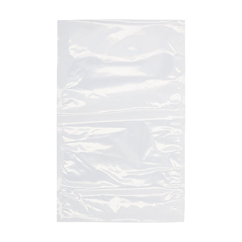 A single, transparent Starpak 100 vacuum seal bag (PA/PE), lying flat on a white background - ideal as a resealable vacuum bag for food or for use with chamber vacuum sealers.