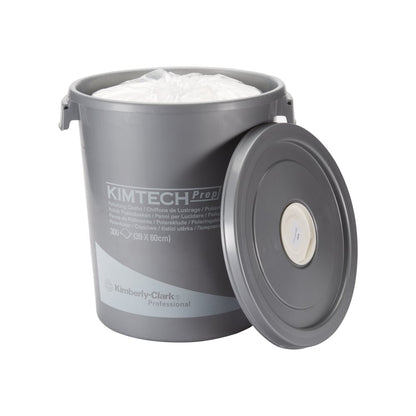 The Kimtech® Polishing Cloths dispenser bucket from Kimberly-Clark GmbH is a gray plastic bucket with the inscription "Kimtech Prep", containing 300 white disposable cloths (29 x 60 cm) for surface cleaning.