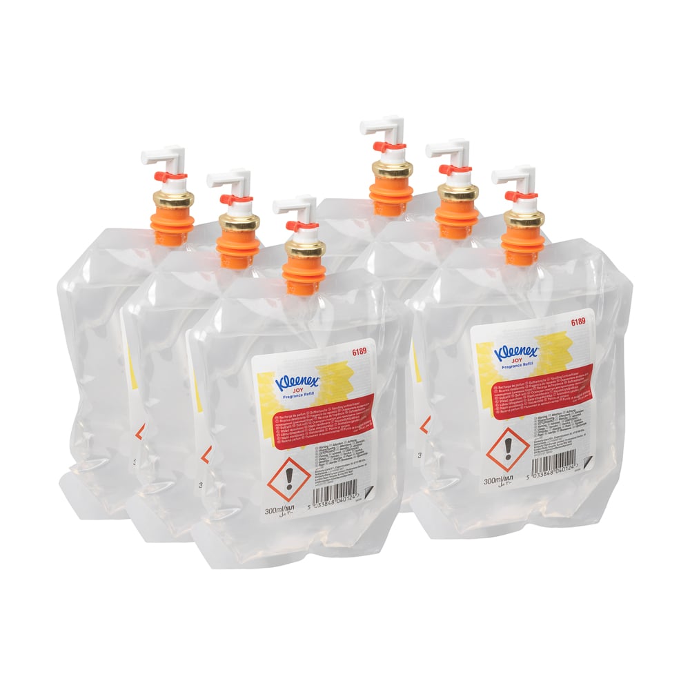 Six transparent 300 ml Kleenex® Scent Joy refill packs from Kimberly-Clark GmbH in a 6-pack cassette with an orange-white spout, labeled for the bathroom and marked with warning symbols.