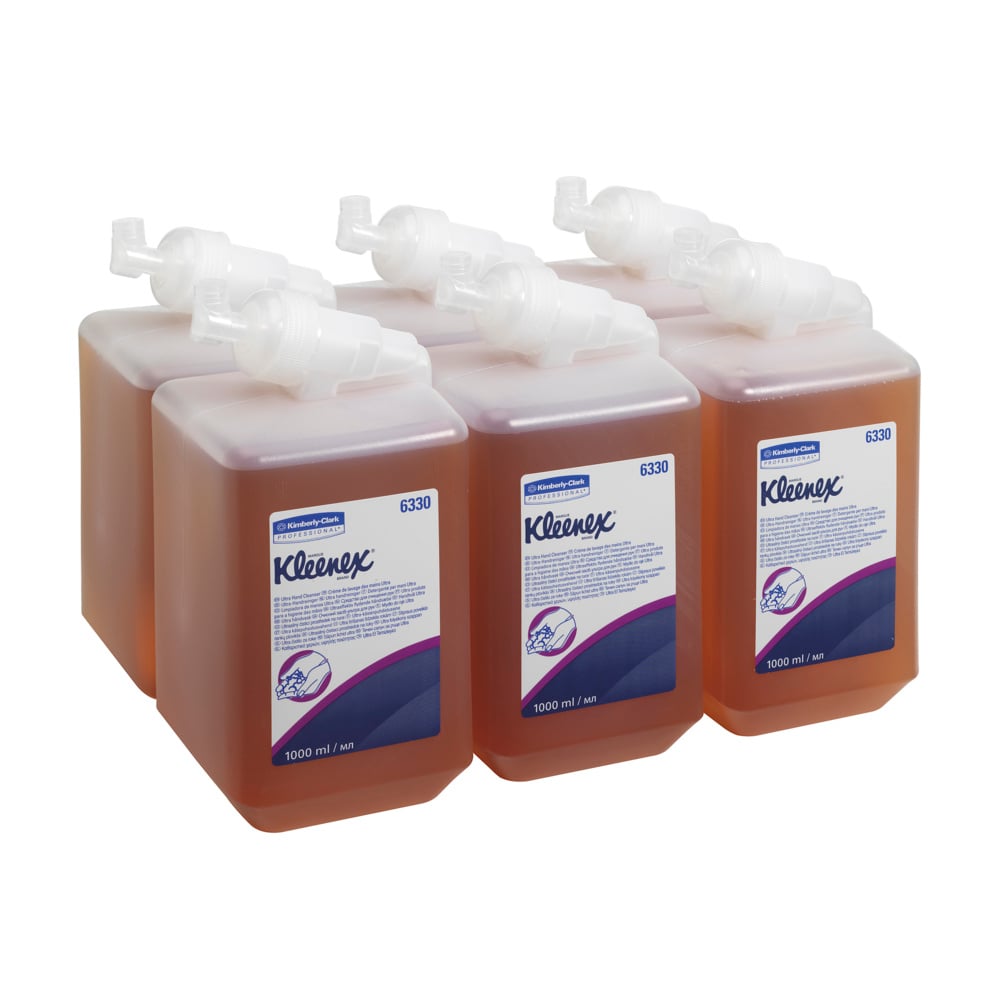 Six 1L cartridges of Kleenex® Ultra™ Wash Lotion Ultra (Caramel) from Kimberly-Clark GmbH are arranged in two rows with labels facing forward. The amber liquid corresponds to the Caramel variant. Each package contains 6 cartridges.