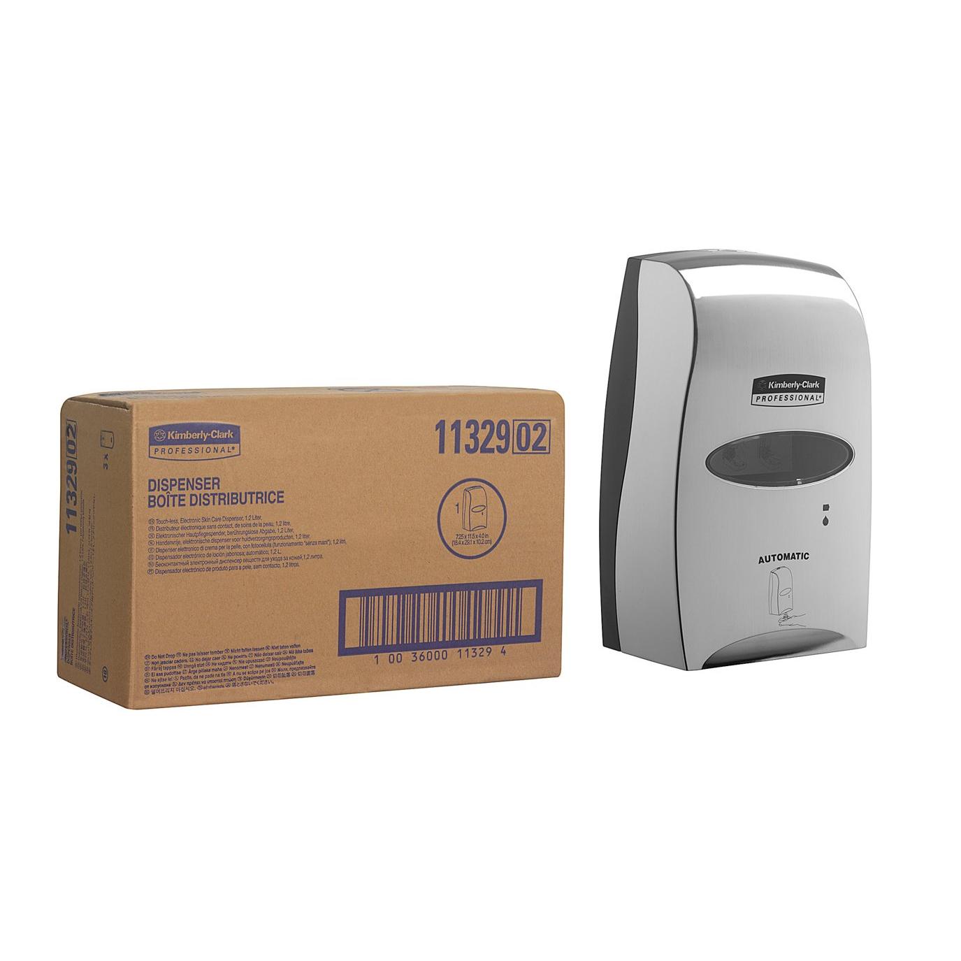 A box labeled "Dispenser" stands next to a shiny Kimberly-Clark GmbH Professional™ electronic skincare dispenser (chrome, 1.2 Ltr) designed for touchless dispensing - 1 dispenser per box.