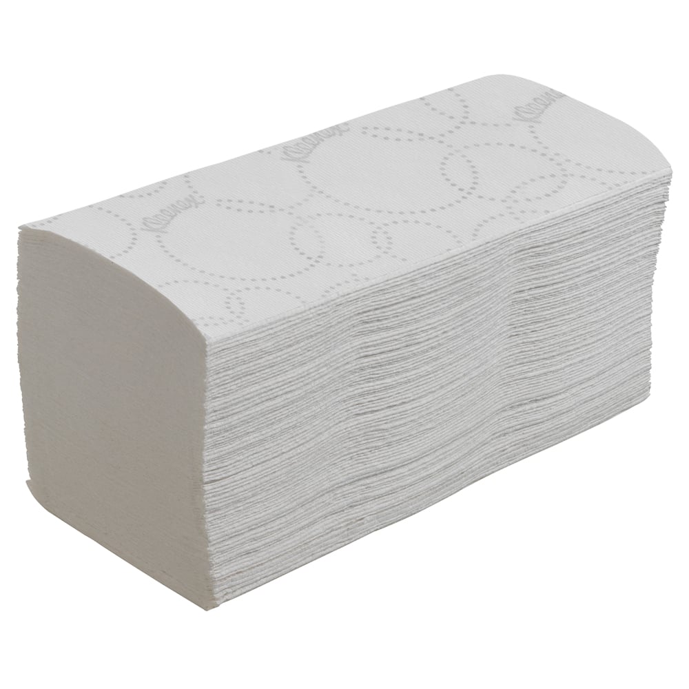 A stack of Kleenex® folded hand towels interfold, white with subtle embossing, by Kimberly-Clark GmbH - 15 clips x 186 sheets per carton - shown slightly angled on a plain white background.