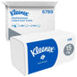A carton of Kleenex® folded hand towels by Kimberly-Clark GmbH (white, interfold) contains 15 packs with 186 sheets each - a total of 2,790 disposable towels. Blue and white branding; open shipping carton visible in the background.