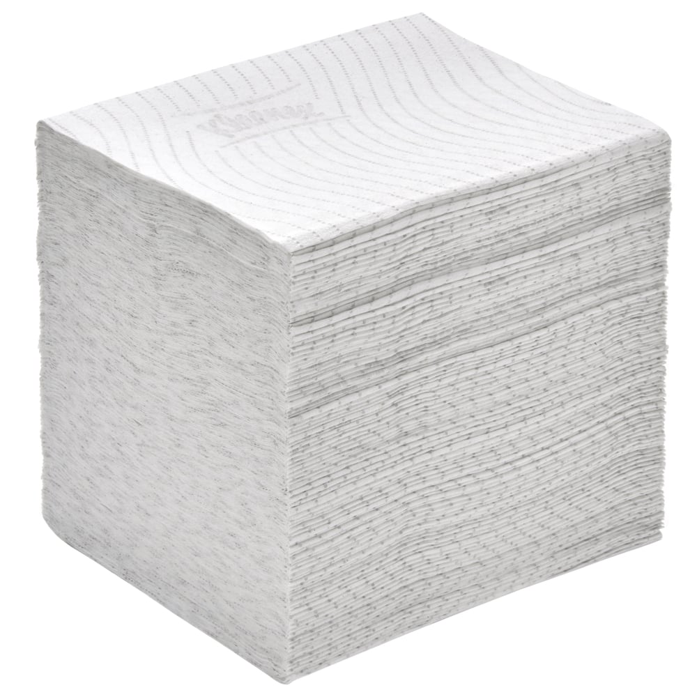 A large stack of white, square Kleenex® toilet paper from Kimberly-Clark GmbH is neatly arranged, ideal for use in the single sheet system. Each box contains 36 packs with 200 high-quality sheets - perfect as premium toilet paper.