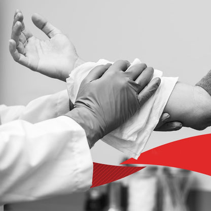 In a black-and-white image with a red graphic at the bottom, a person wearing gloves wipes another person's arm with Kimberly-Clark GmbH WypAll® L40 PowerClean quarter-folded wipes (white, 18 x 56 sheets), possibly before a medical procedure.