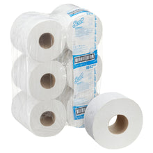 A carton with 12 large white Scott® Essential™ Jumbo toilet paper rolls from Kimberly-Clark GmbH, each roll with 526 sheets. The blue and white packaging features the Scott brand and product information, with a roll pictured at the front.