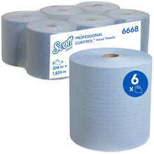 Pictured is a six-pack of blue Scott® hand towels - roll from Kimberly-Clark GmbH; one roll in front, the rest packaged. Each roll is 304 m x 19.8 cm, totaling 1,824 m of professional sustainable paper towels.