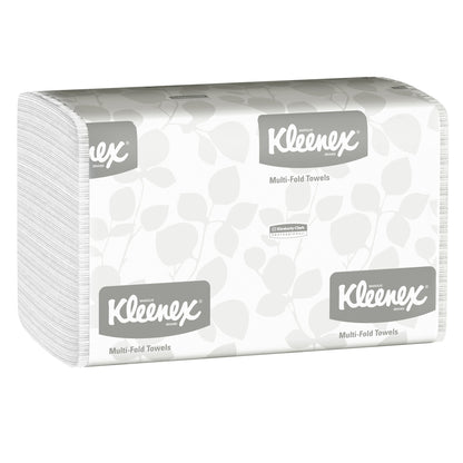 A stack of Kleenex® Hand Towels - MultiFold in white, packaged by Kimberly-Clark GmbH (16 packs x 150 sheets), with leaf-patterned branding packaging with the inscription "Multi-Fold Towels" - perfect for washrooms.