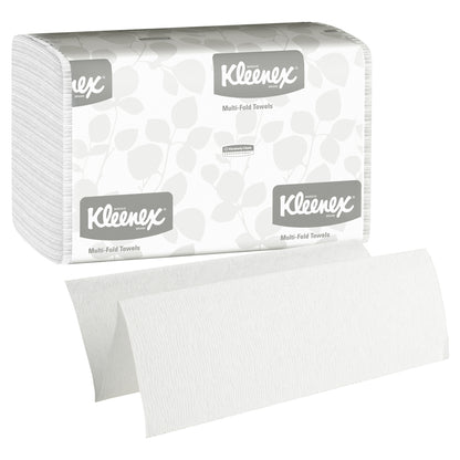 A stack of white Kleenex® Hand Towels - MultiFold (16 clips x 150 sheets) by Kimberly-Clark GmbH is shown in a partially opened package with a leaf pattern and the Kleenex logo. One towel is unfolded, ideal for washrooms.