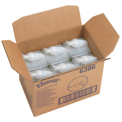An open box labeled "Kleenex® Botanics™ Luxury Foam Hand Wash - 1L Cartridge" from Kimberly-Clark GmbH contains six green 1L cartridges, information, and a barcode. The box highlights foam soap with botanical extracts.