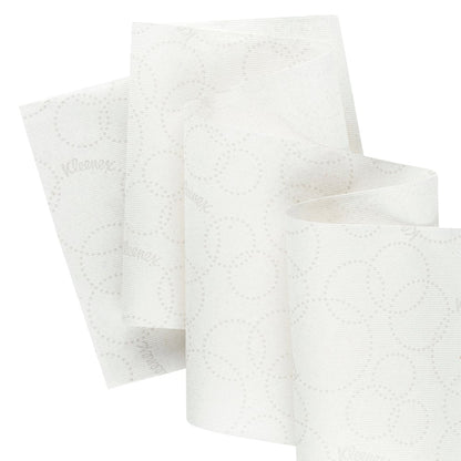 A close-up of the white, 1-ply Kleenex® Roll Towels - E-roll Slimroll™ from Kimberly-Clark GmbH (6x135m), featuring a subtle circular pattern, ideal for use in Slimroll dispensers.