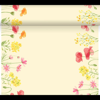A pale yellow DC-Tete a Tete 0.4x24m by Duni GmbH is adorned with watercolor pink, yellow, and red wildflowers on the edges, reminiscent of a charming garden. The center is free for writing or drawing.