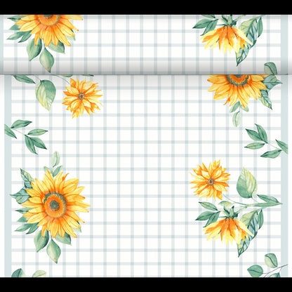 The DC-Tete a Tete 0.4x24m by Duni GmbH features a white background with a light gray grid and yellow sunflowers with green leaves in each corner, creating a decorative border reminiscent of summer.