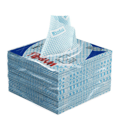 A stack of blue WypAll® X80 Plus Critical Clean wipes from Kimberly-Clark GmbH, quarter-folded, lies in the carton (8 packs x 30 wipes), with one wipe partially pulled from the top slot.