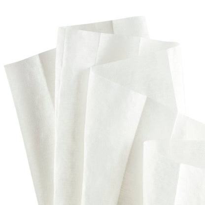 Several WypAll® X60 General Clean quarter-folded cleaning cloths from Kimberly-Clark GmbH are spread out against a white background, demonstrating their efficient cleaning for any task. Carton: 12 bags x 76 cloths.