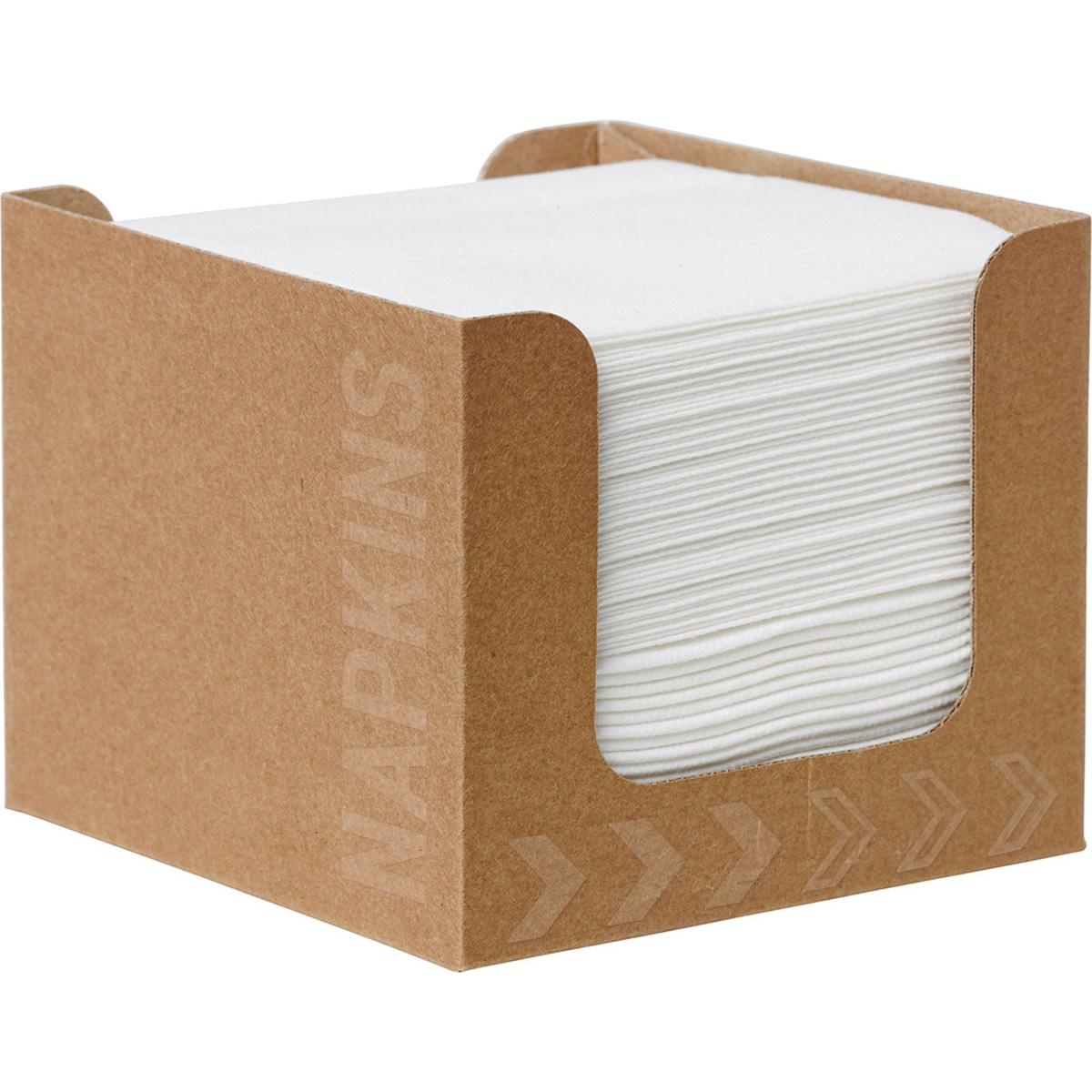 A stack of Bio-Dunisoft napkin boxes 20 x 20 cm white by Duni GmbH is neatly placed in a brown napkin holder with the print "NAPKINS" on the side.