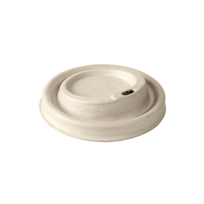 The Duni GmbH Bagasse Coffee to Go Lid for all cups microwaveable is a beige, biodegradable lid with a small oval drinking hole and raised edge, depicted on a white background.